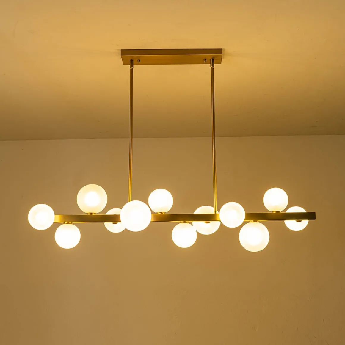 12-Light Brass Frosted Glass Bubble Linear Chandelier