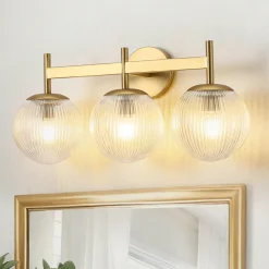 3-Light Brass Ribbed Glass Globe Vanity Wall Sconce