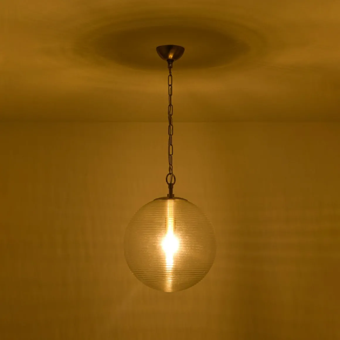 Mid-Century Brass 1-light Clear Reeded Glass Globe Pendant