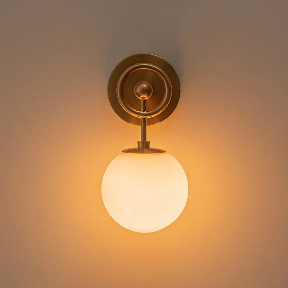 Mid-Century 1-Light Opal Glass Globe Armed Vanity Wall Sconce